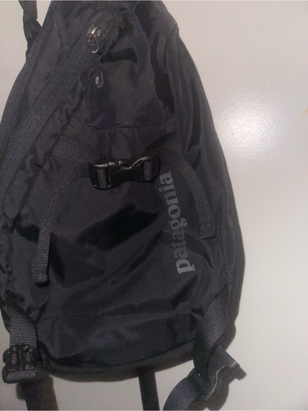Patagonia Black Sling Pack with Front Buckle and Logo